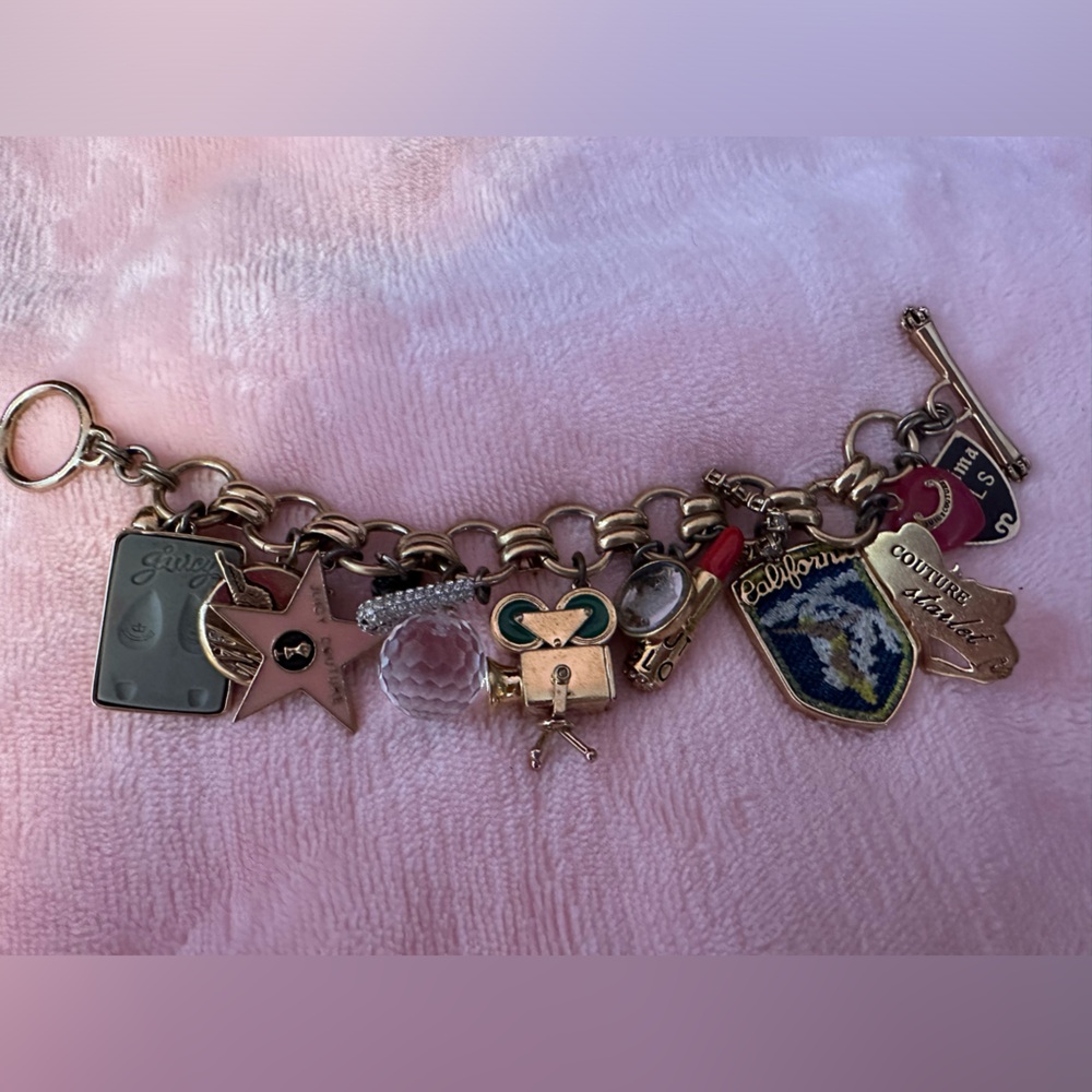 Used “like New Condition” Juicy Couture Hollywood charm bracelet